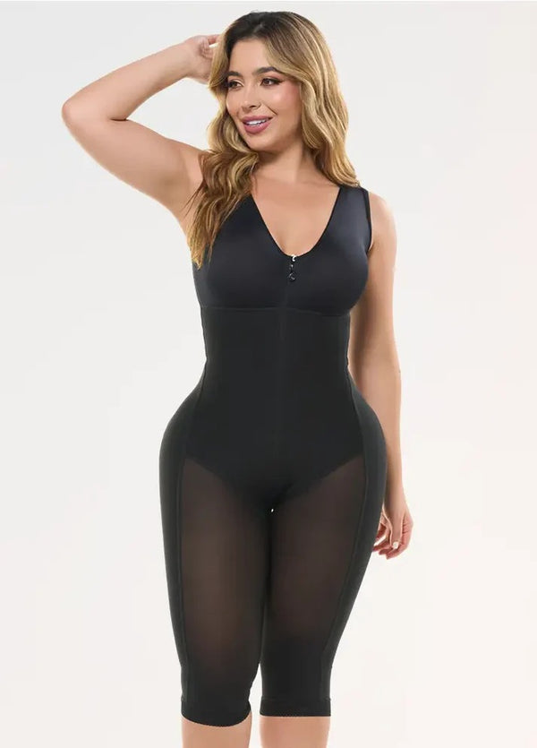 Woman wearing a black bodysuit on a white background