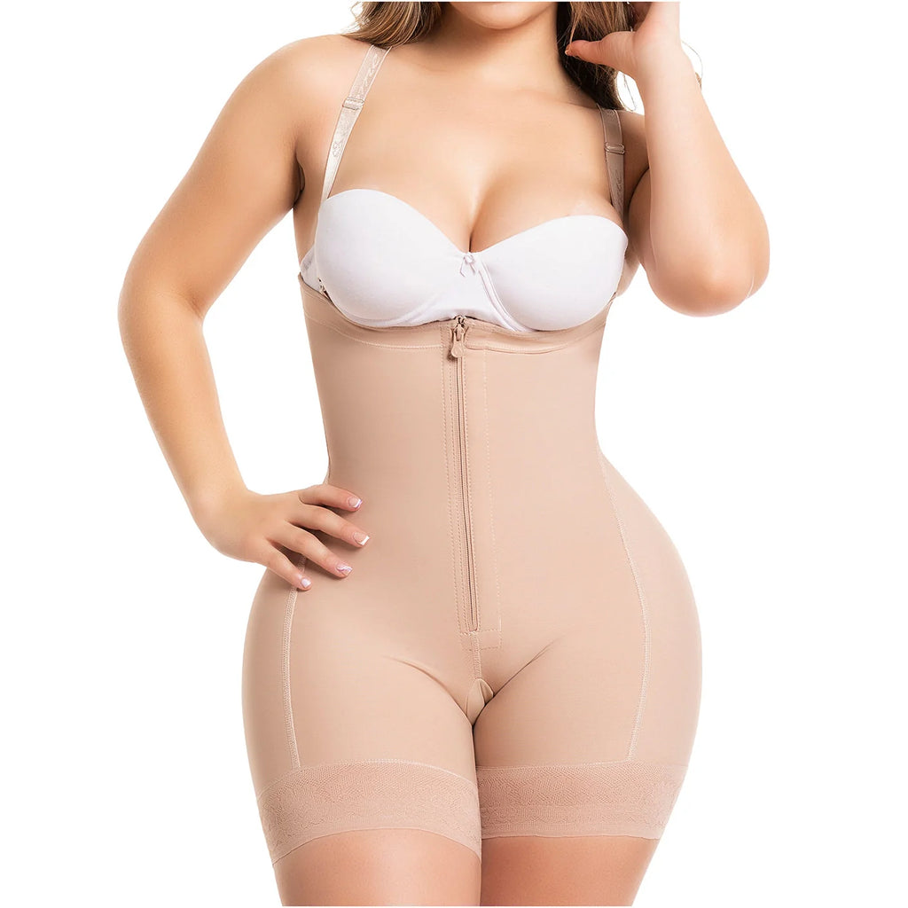 Woman wearing a beige shapewear garment on a white background