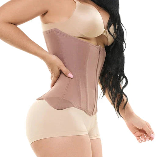 Woman wearing a beige waist trainer on a white background