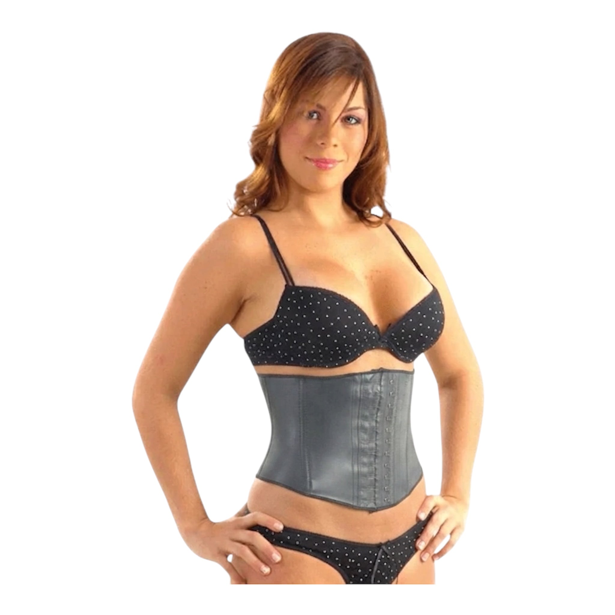 Woman wearing a black polka dot corset on a white background