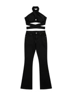Stella's Corset black butt lifter jeans paired with a matching black halter crop top for a sleek silhouette.