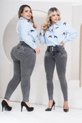 Two models wearing Stella's Corset high-waisted grey skinny jeans with a butt-lifting design and black high heels.