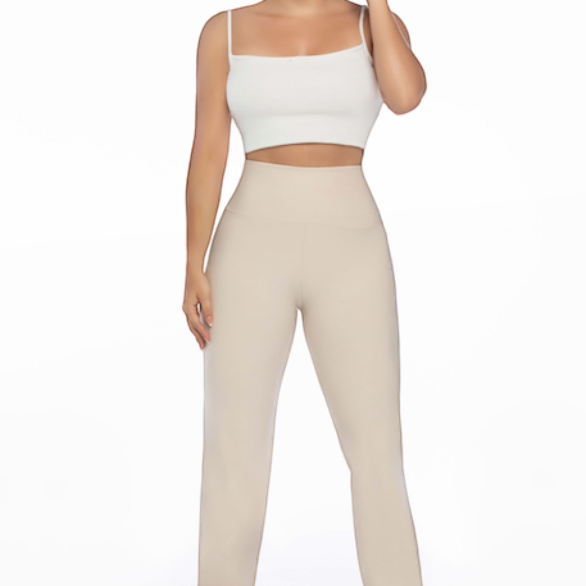 Stella's Corset beige athletic pants with a high waist, designed for performance and comfort.