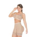 Stella's Corset beige high-compression Powernet butt lifter shorts with lace trim worn by a smiling model