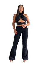 Stella's Corset black butt lifter jeans with high-density stretch denim and contouring panels on a model