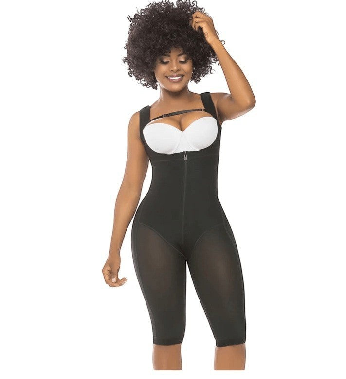 Model wearing a black Stella's Corset open-bust compression bodysuit with front zipper and thigh-length design.