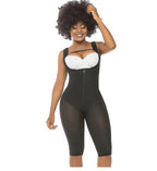 Model wearing a black Stella's Corset open-bust compression bodysuit with front zipper and thigh-length design.