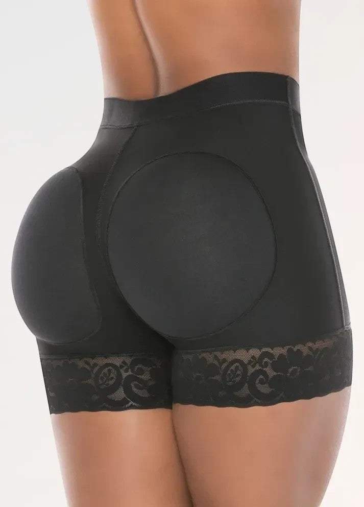 Stella's Corset black high-compression Powernet butt lifter shorts with lace trim and seamless design on a model