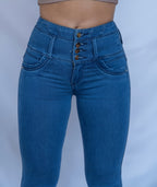 Stella's Corset blue denim high-waist butt lifter jeans with button fly and contoured back panels.