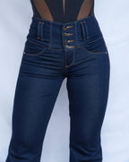 Stella's Corset dark wash denim butt lifter jeans with a high waist and four-button closure, flared legs.