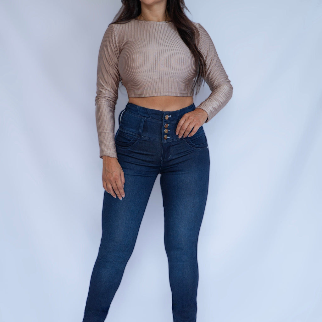 Stella's Corset dark wash high-waist butt lifter jeans with button fly and skinny flare leg.