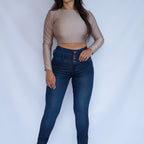 Stella's Corset dark wash high-waist butt lifter jeans with button fly and skinny flare leg.