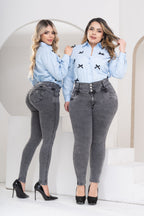 Two models wearing Stella's Corset high-waisted grey skinny jeans with a butt-lifting design and button-up waist.