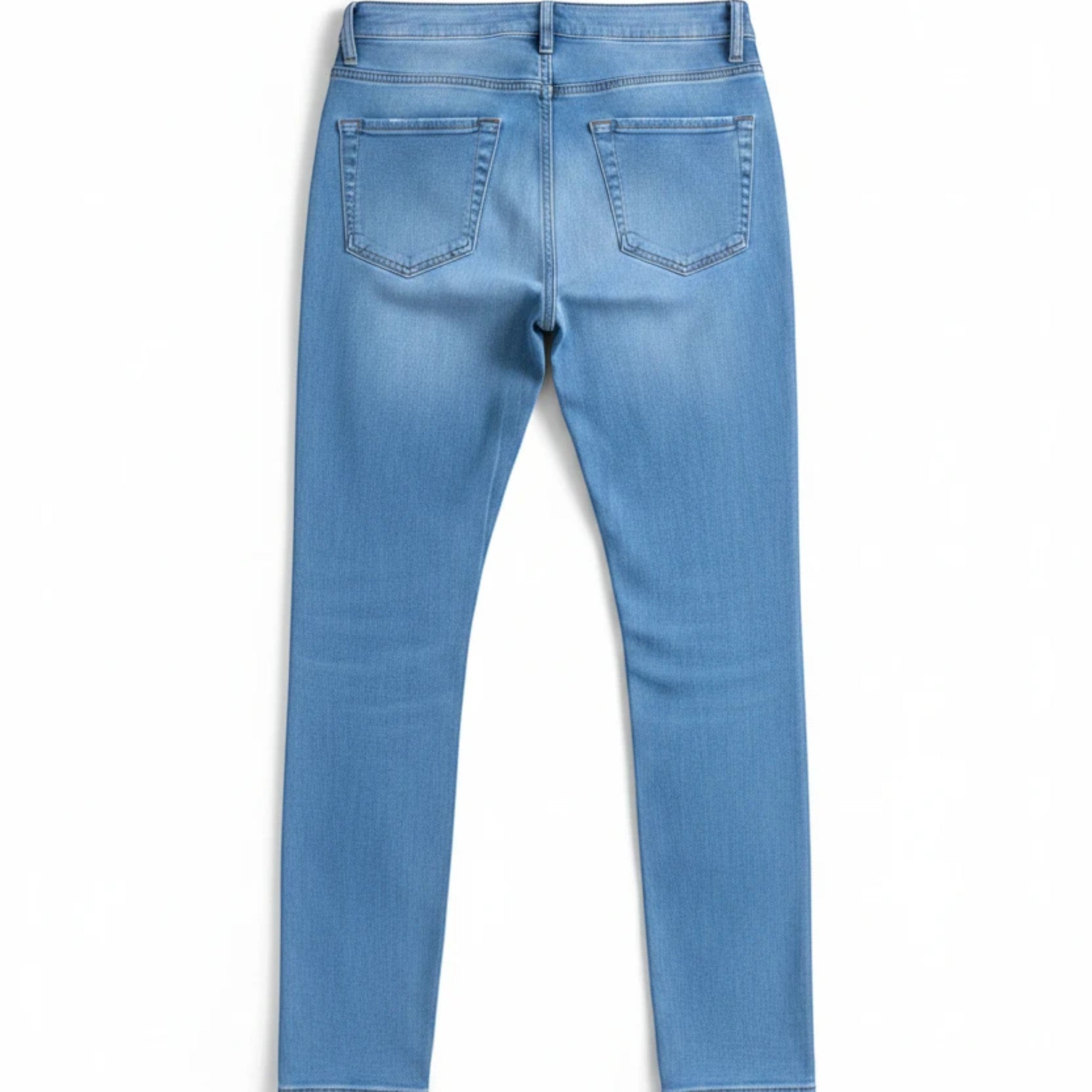 Stella's Corset light blue high waisted skinny leg butt lifter jeans with five-pocket styling.