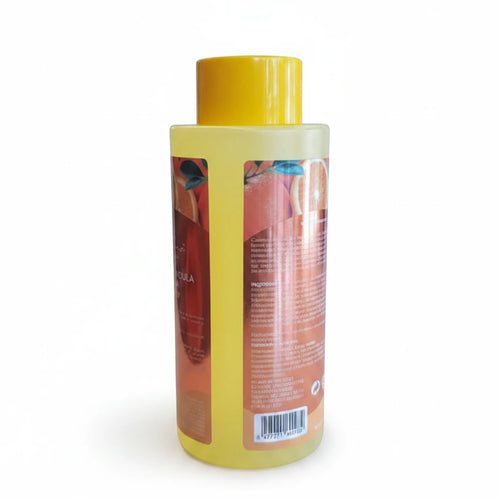 Stella's Corset Orange & Calendula Restorative Massage Oil bottle with yellow cap. Hydrating, nourishing, and stretch mark prevention formula.