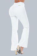 Stella's Corset white high-waisted butt lifter jeans with heart stitching and button detail on flared leg.